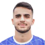 V. Veliu
