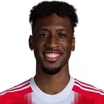 K. Coman